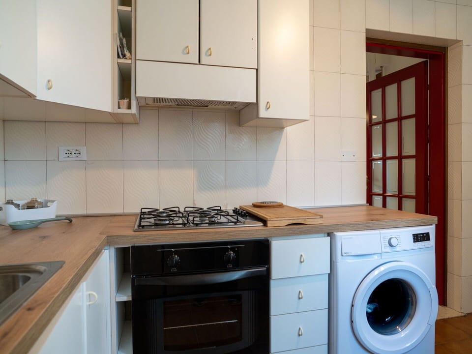 Cabinetry, Property, White, Countertop, Laundry Room, Kitchen Sink, Interior Design, Wood, Kitchen Stove, Kitchen