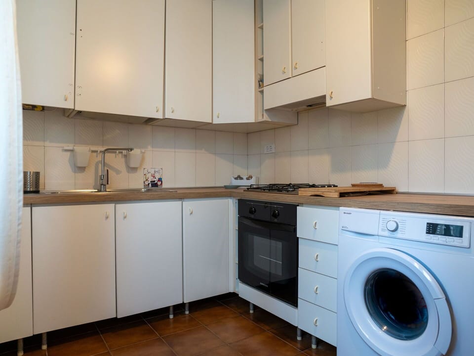 Laundry Room, Cabinetry, Property, Tap, Sink, Washing Machine, Product, Clothes Dryer, Kitchen Sink, Countertop