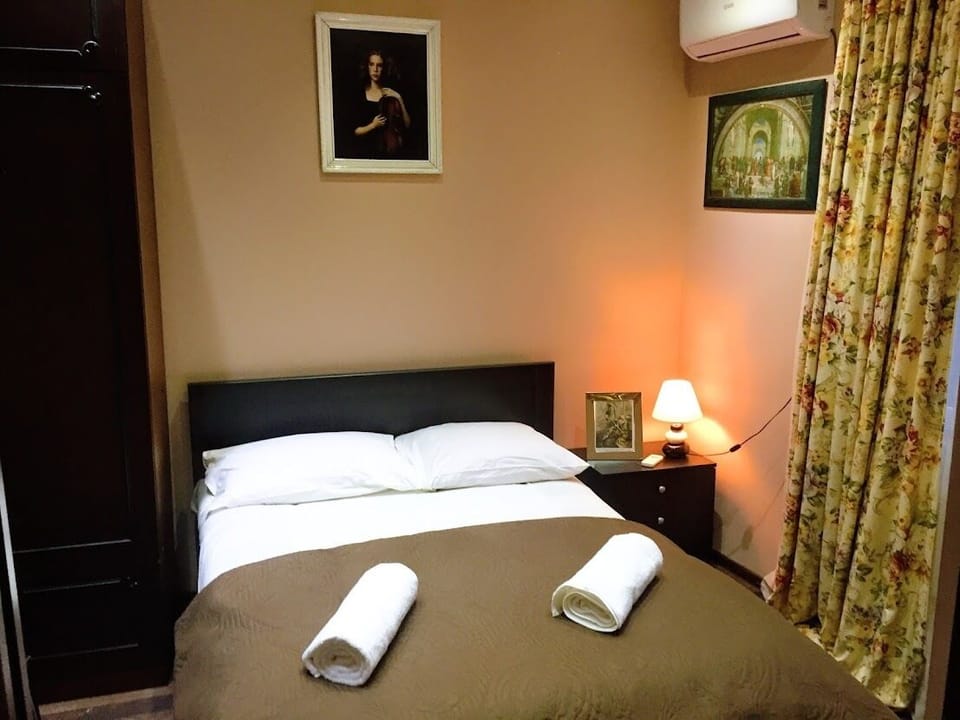 Desk, laptop workspace, free WiFi, bed sheets