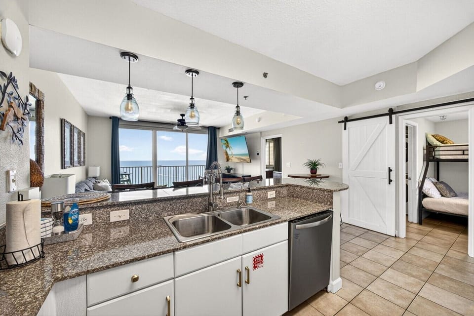 Enjoy a spacious kitchen with bar seating and sightlines straight through to the emerald Gulf waters.