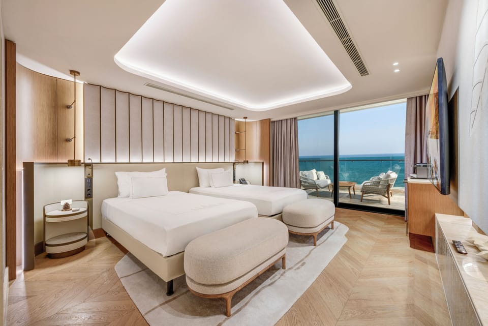 Crown Horizon Suite | Premium bedding, minibar, in-room safe, blackout drapes