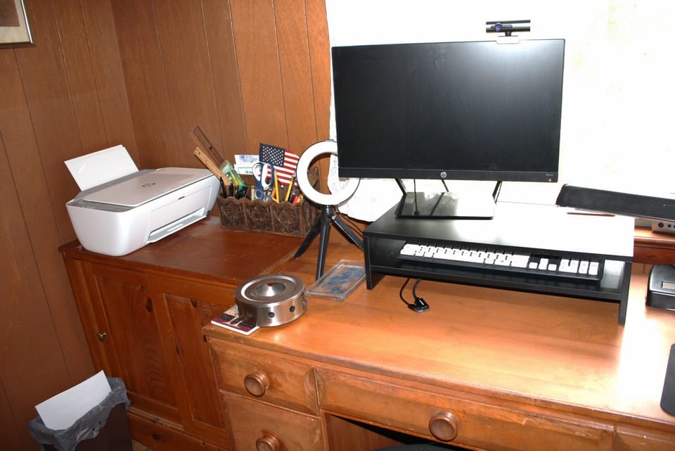 Office: Printer, monitor, keyboard, web cam, super-fast fiber optic Internet.