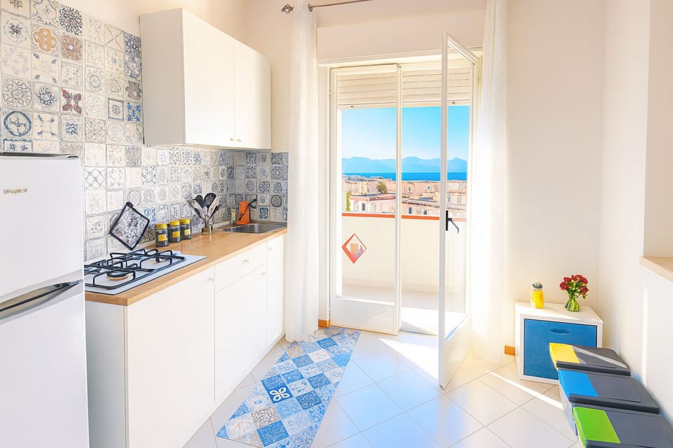 Apartment, Partial Sea View | Private kitchen | Highchair