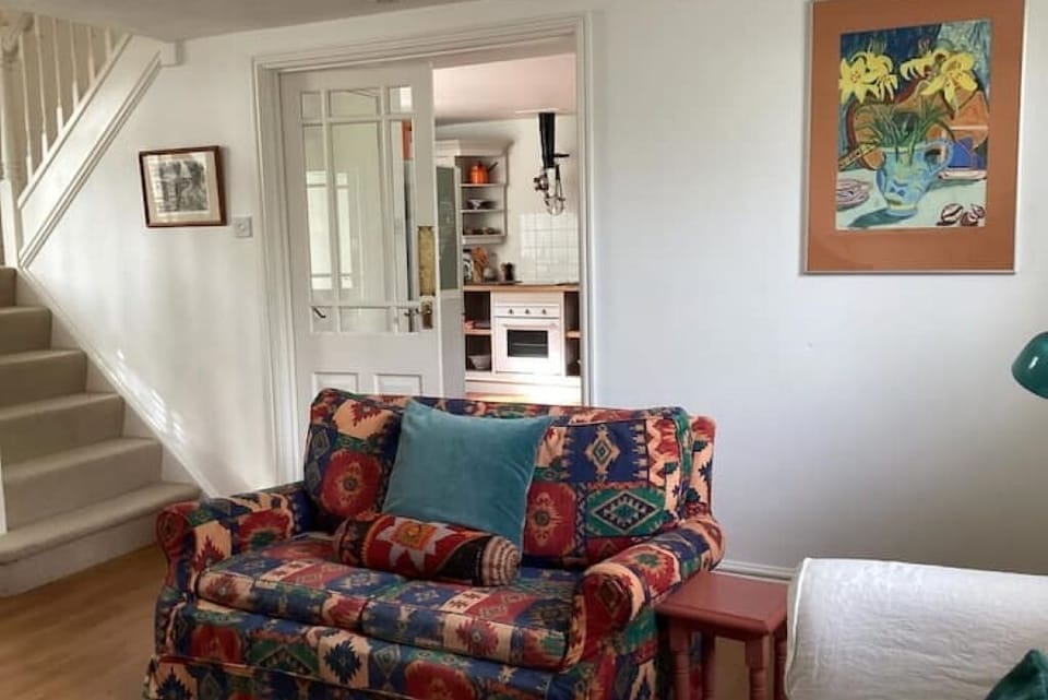 Looking from the sitting room into the kitchen