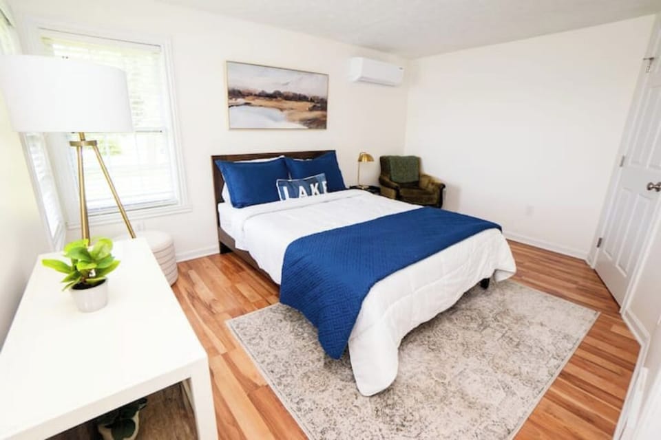 Master Bedroom with queen bed and view of lake