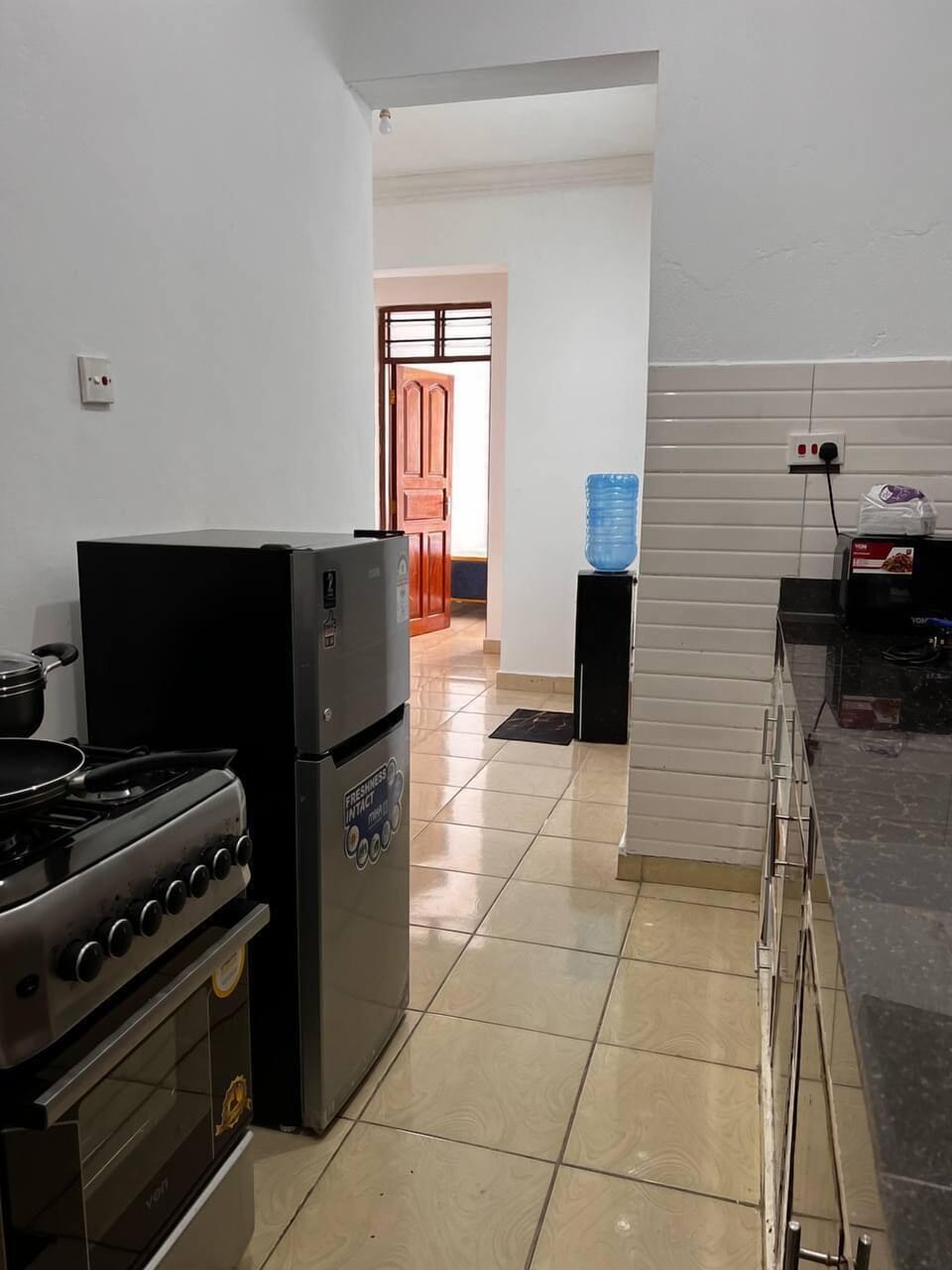 Deluxe Apartment, Balcony, City View | Private kitchen | Fridge, microwave, cookware/dishes/utensils
