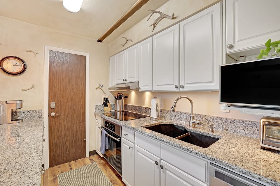 Chef-friendly kitchen with ample counter space and premium cookware.