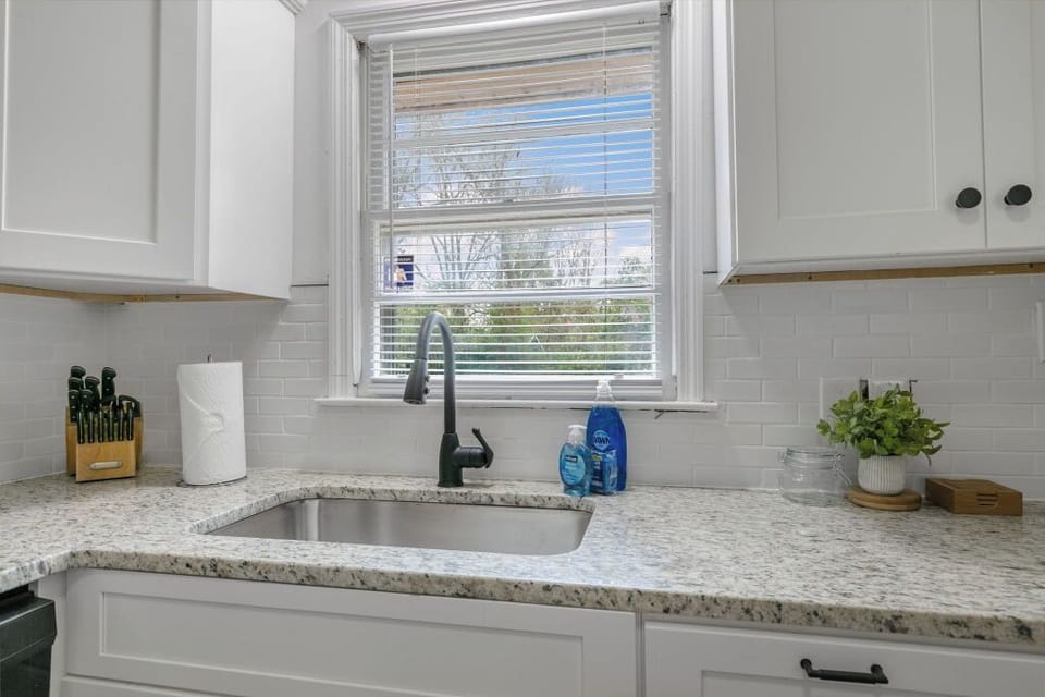 Prep meals with ease at the spacious stainless steel sink.
