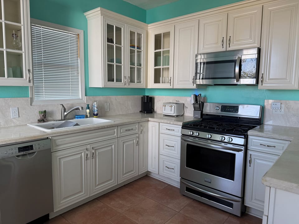stove, microwave, toaster,and coffee maker