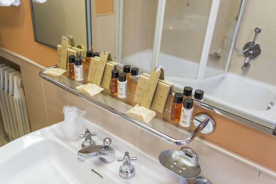 Eco-friendly toiletries, hair dryer, bidet, towels