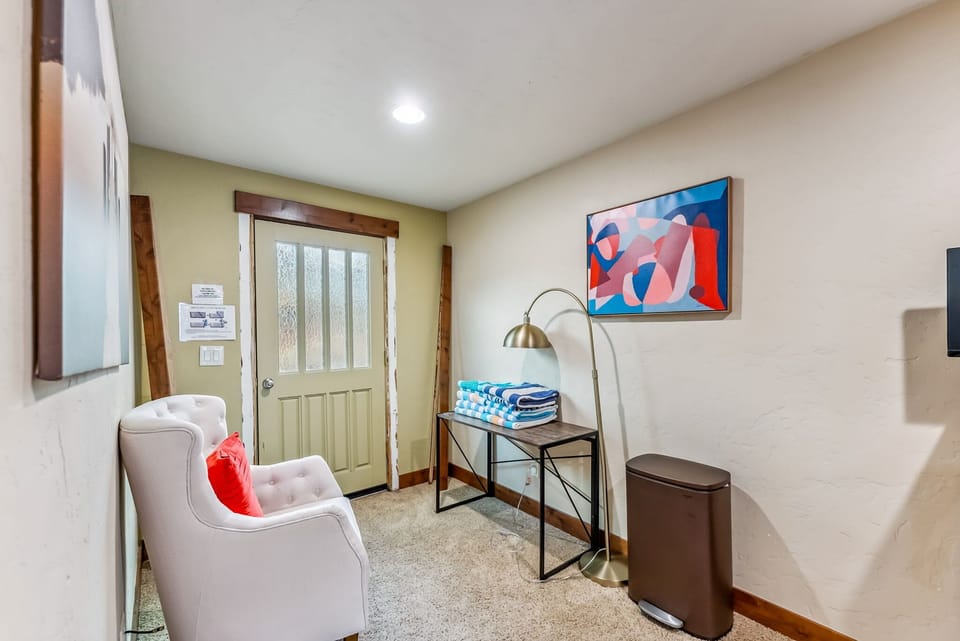 Den: Desk, chair, access to hot tub, middle floor
