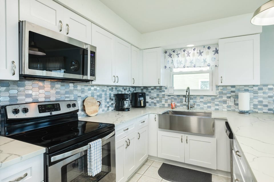 Fully stocked kitchen with modern appliances