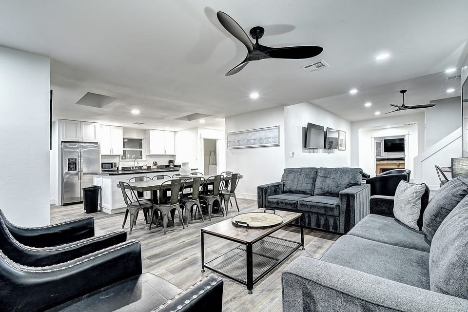 Huge Spacious great room design with dining table for 24 guests