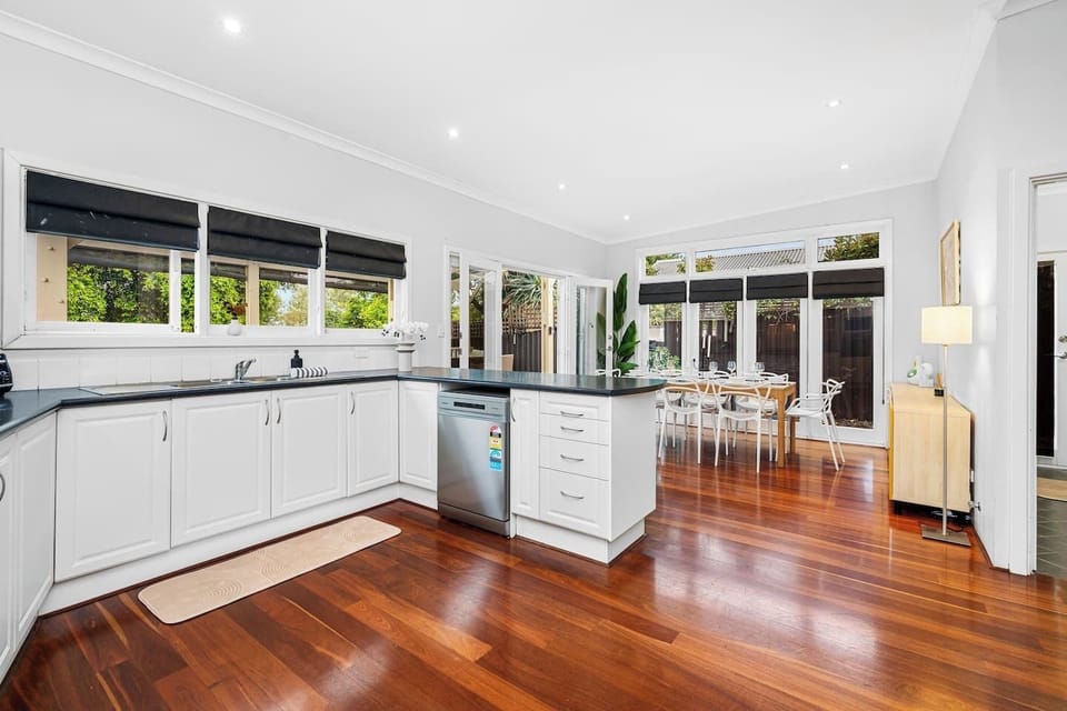 Spacious kitchen with island bench.