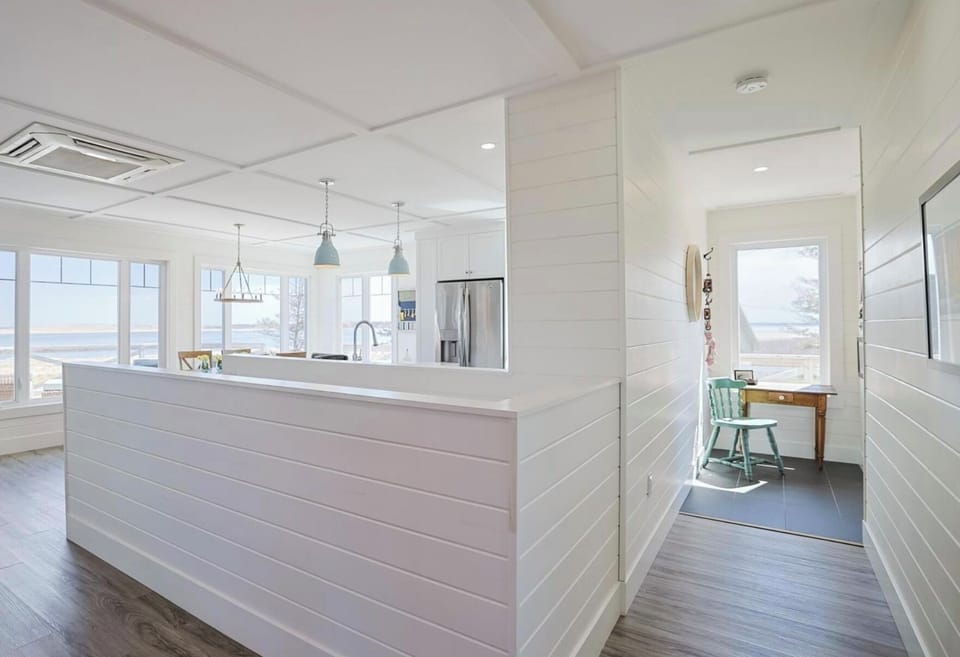Bright open concept living with plenty of windows to enjoy views & ocean breeze.
