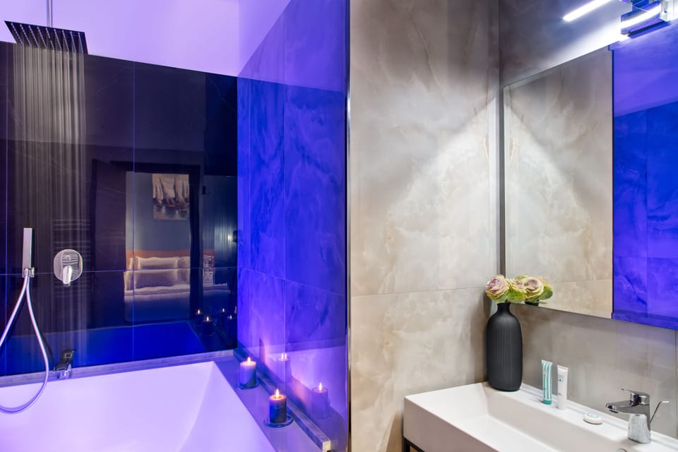 Suite | Bathroom | Hair dryer, slippers, bidet, towels