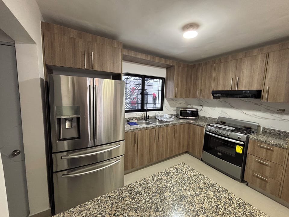 Comfort Apartment | Private kitchen | Full-size fridge, microwave, oven, cookware/dishes/utensils