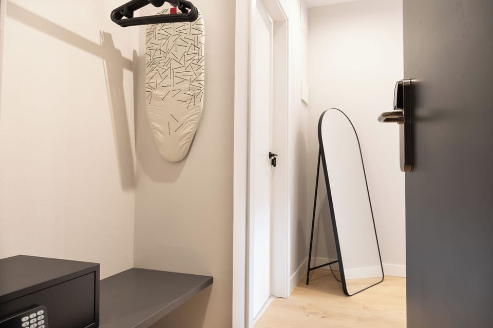 In-room safe, desk, laptop workspace, iron/ironing board