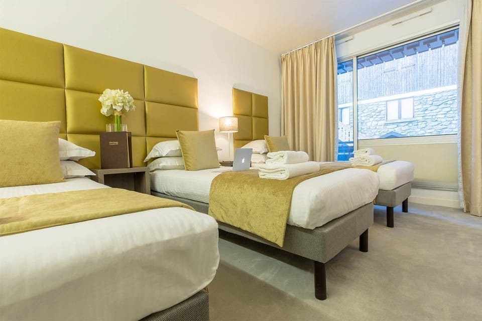Get a peaceful night sleep in our cozy bedroom, which has 3 Single beds.