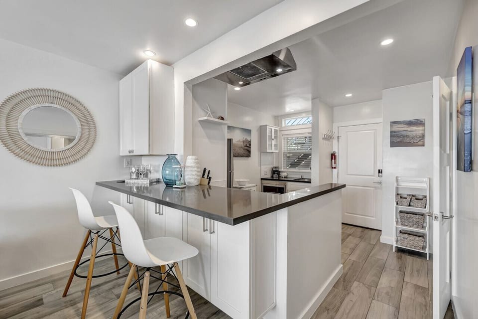 A sleek kitchen with a spacious island
