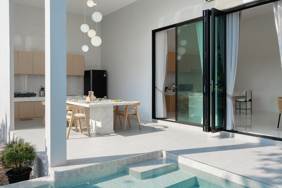 Deluxe Villa, 3 Bedrooms, Pool View | Living area | 32-inch flat-screen TV with cable channels