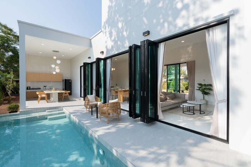 Deluxe Villa, 3 Bedrooms, Pool View | Living area | 32-inch flat-screen TV with cable channels
