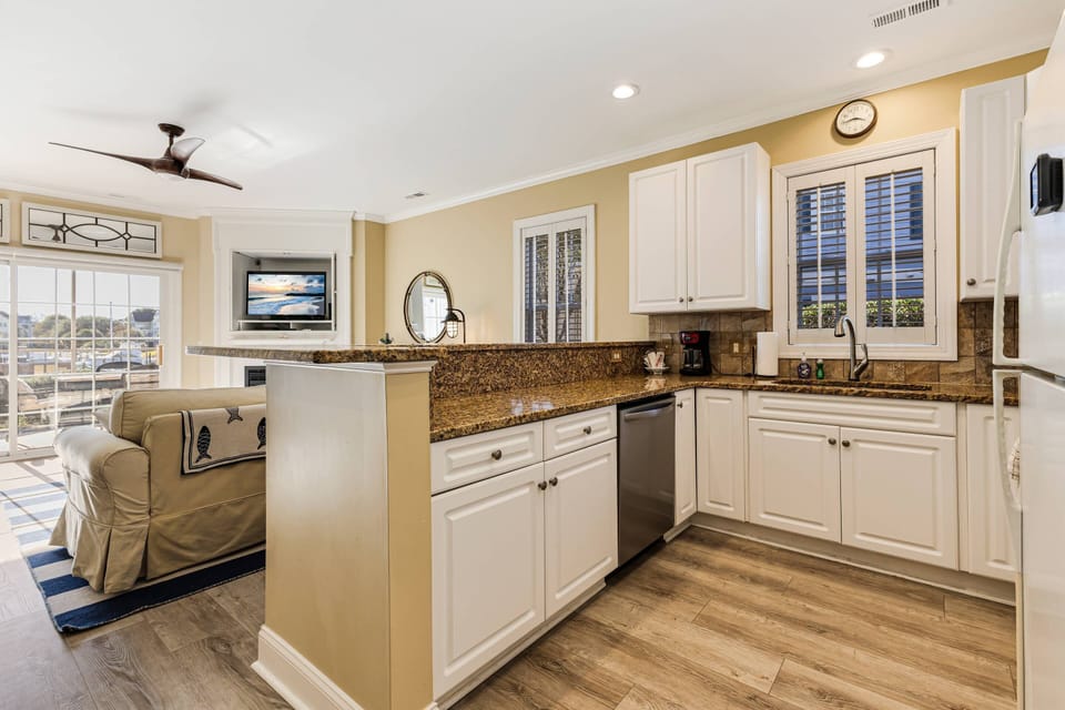 Enjoy stunning marina views while you cook in the well-equipped kitchen.