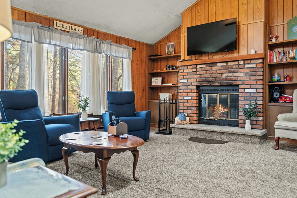 Fireplace and tons of natural light in the living room.