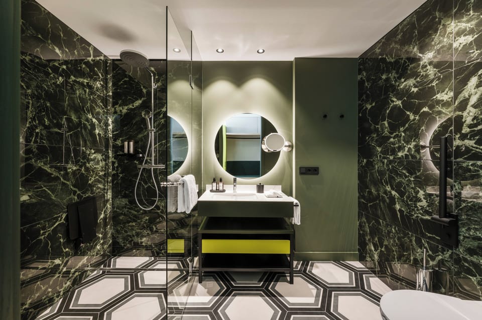 Deluxe Double Room | Bathroom | Shower, rainfall showerhead, eco-friendly toiletries, hair dryer