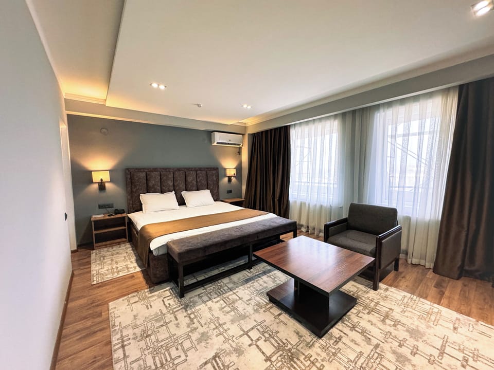Deluxe Double Room, Balcony, City View | In-room safe, desk, laptop workspace, WiFi (free)