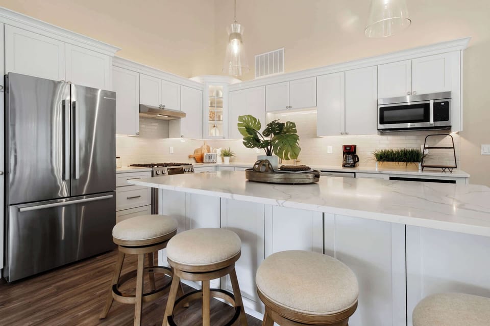 Sip morning coffee or grab a bite at the kitchen counter, with seating for 4