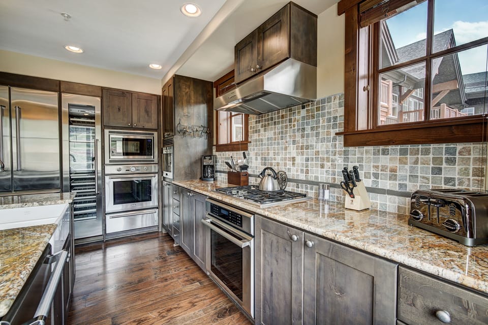 Condo, 4 Bedrooms | Private kitchen | Coffee/tea maker, fridge, oven, toaster