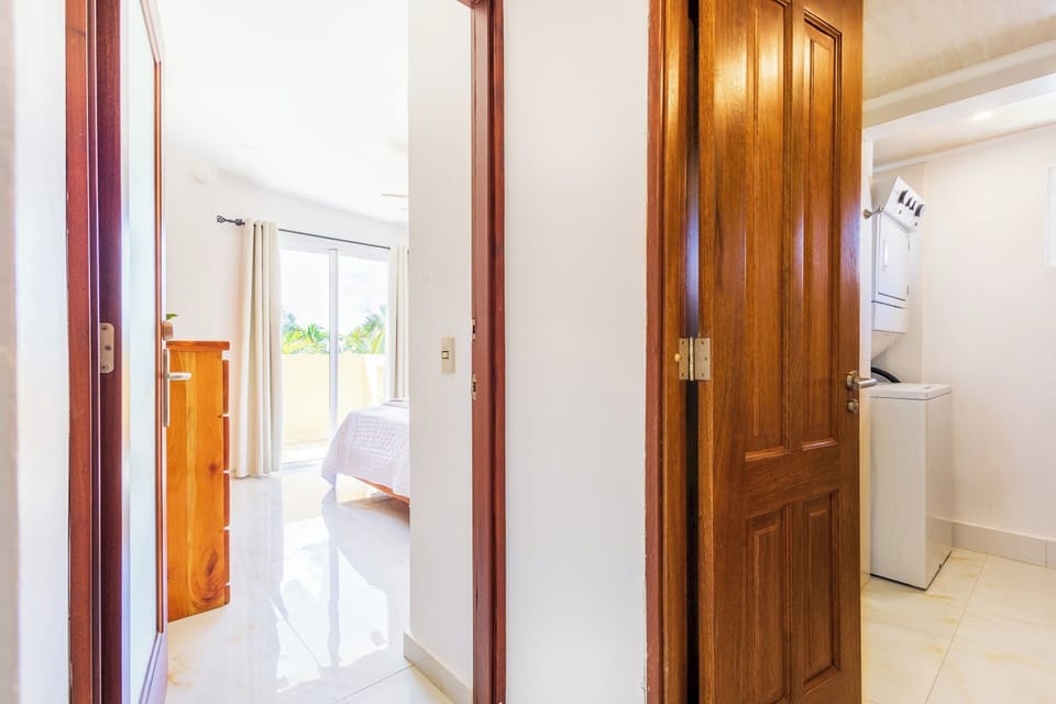 The bathrooms come with fresh towels, toiletries, and large mirrors.