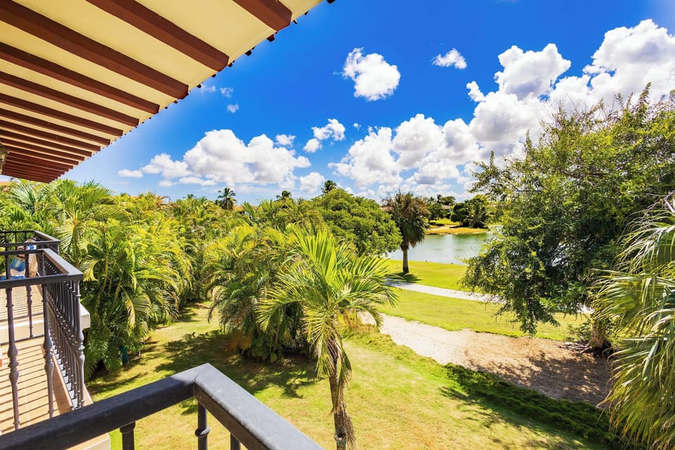 Enjoy serene pond views from your furnished balcony.