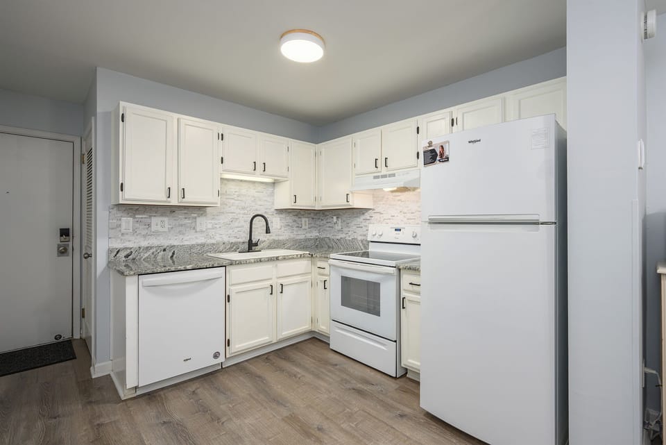 Thoughtfully designed kitchen with a dining table for 4, offering a comfortable space to dine, connect, and unwind.