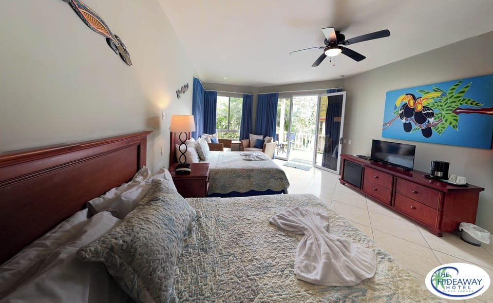 Deluxe Room, 2 Queen Beds | In-room safe, blackout drapes, soundproofing, iron/ironing board