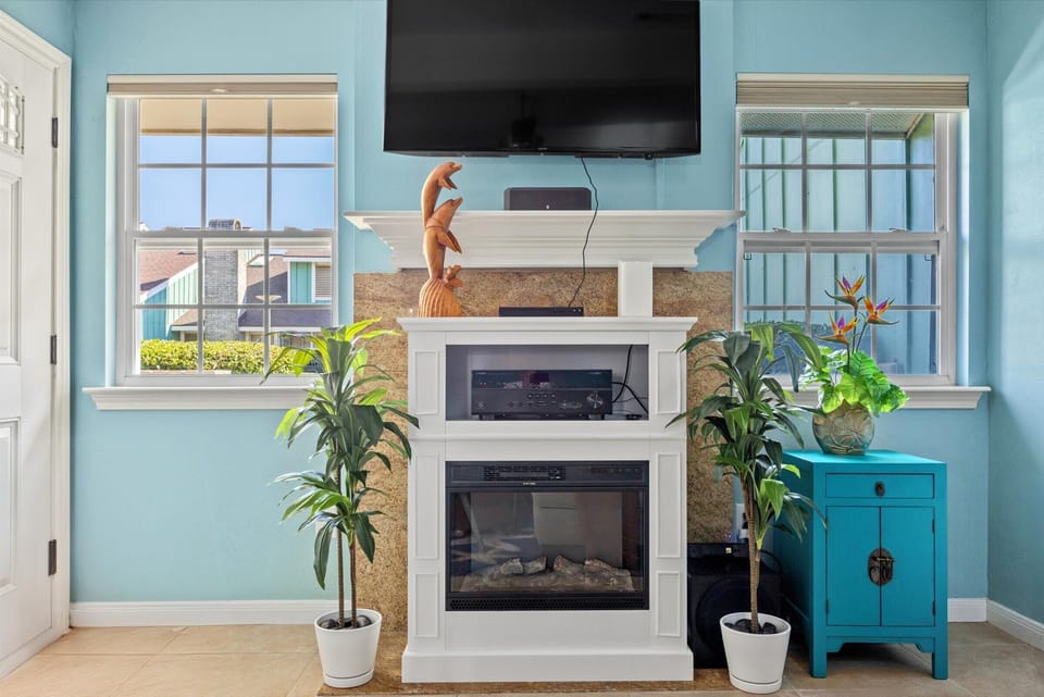 electric fireplace and entertainment center in living room