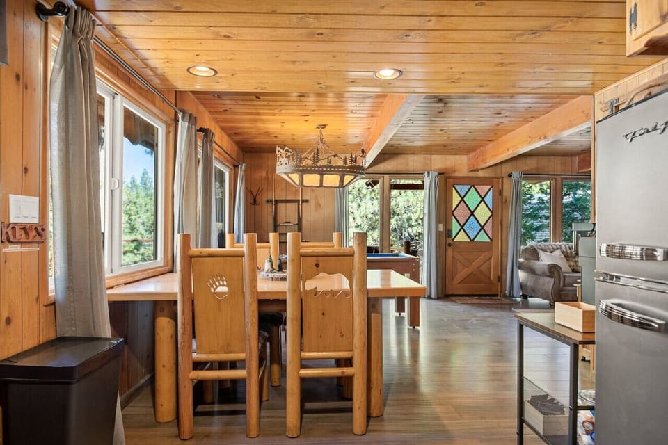 The main floor is spacious and is sure to be the gathering spot for your crew. Visit while you cook a hot meal, gather around the fire with your choice of games, or play a game of pool!