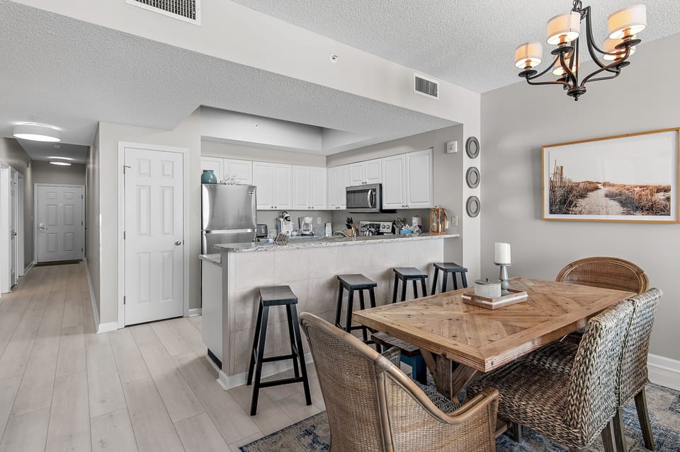Plenty of seating at the dining table and the kitchen bar!