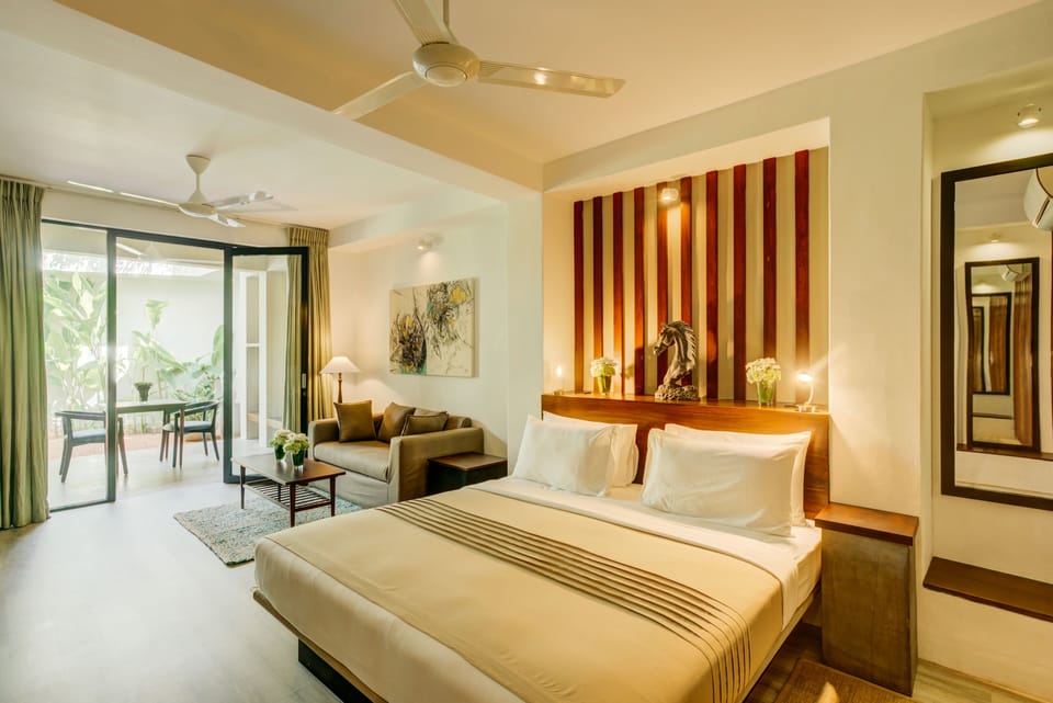 Deluxe King Room with Private Courtyard & Sitting Area | 13 bedrooms, in-room safe, iron/ironing board, free WiFi