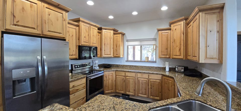 Fully stocked and spacious kitchen.