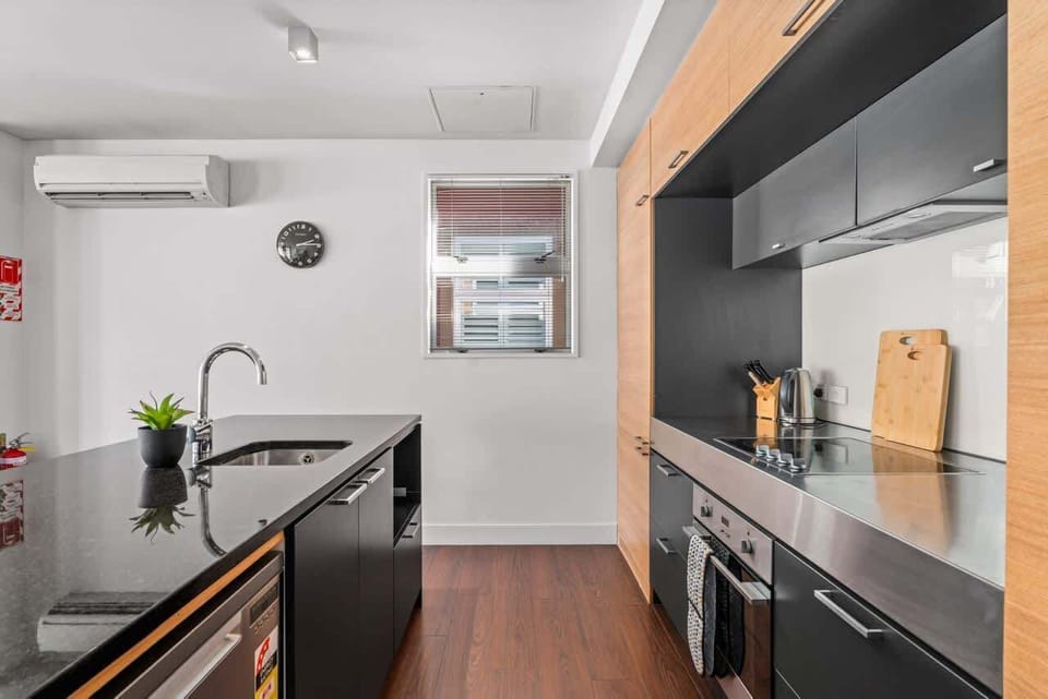 Contemporary kitchen designed for easy meal preparation during your stay