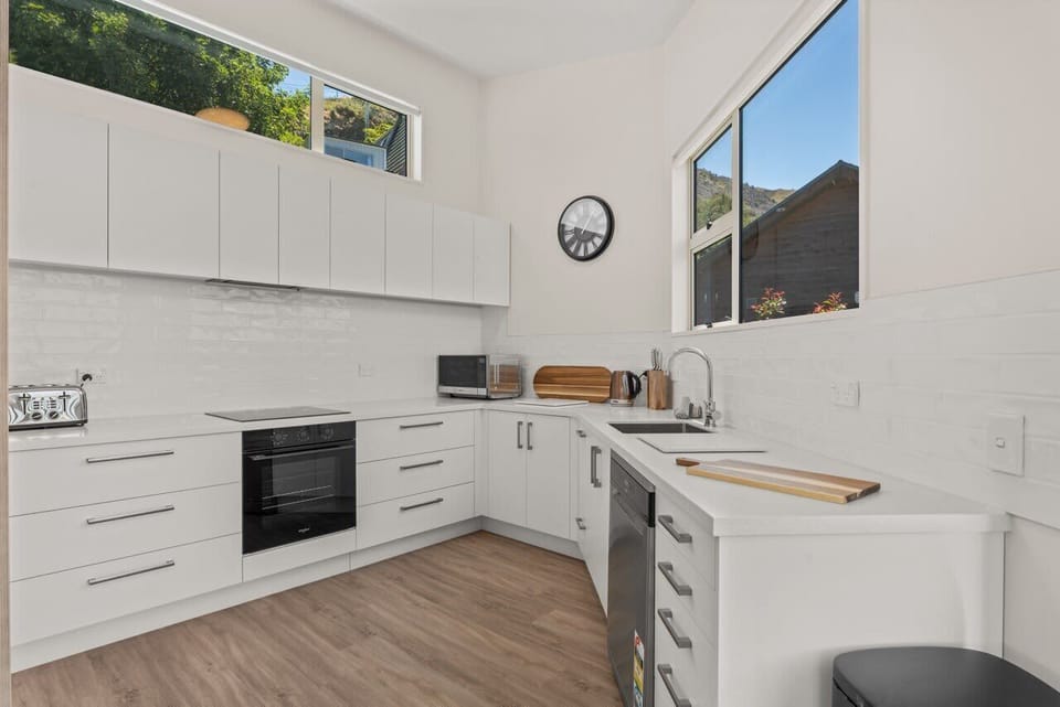 Enjoy a fully equipped kitchen with mountain views