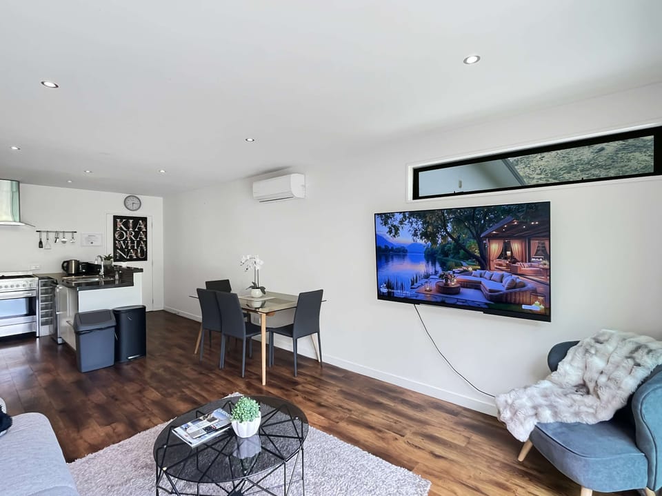 Open-plan living and dining with comfortable seating