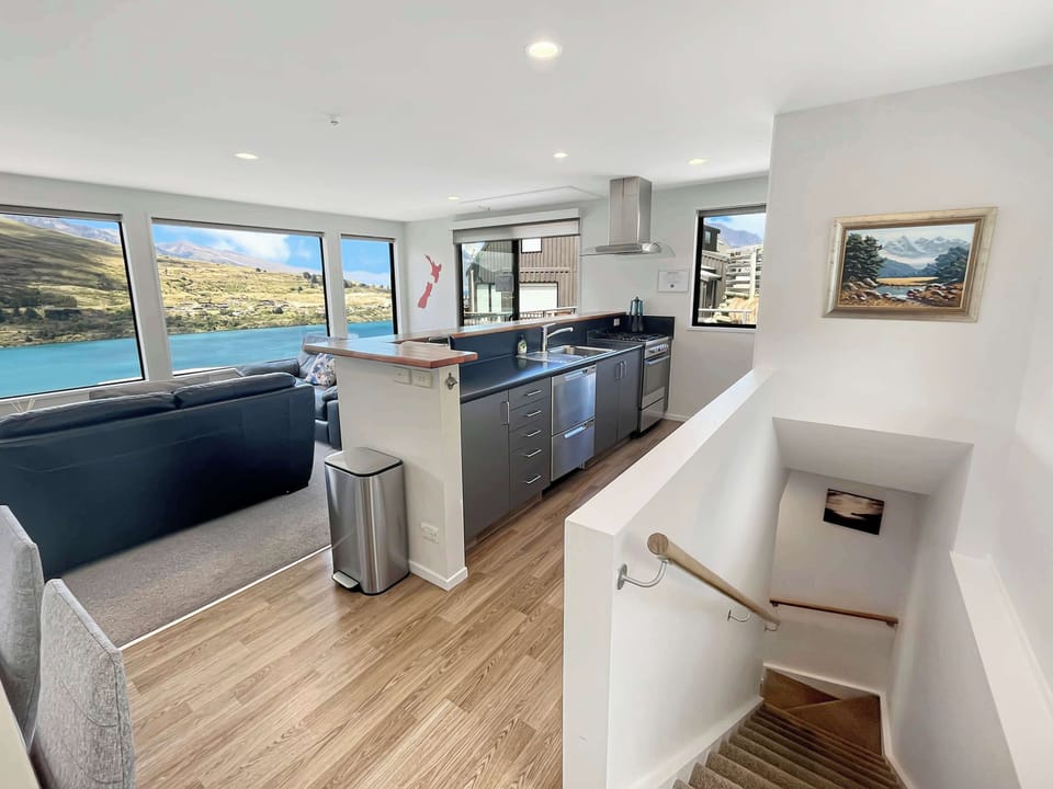 Open-plan kitchen and living with stunning lake views