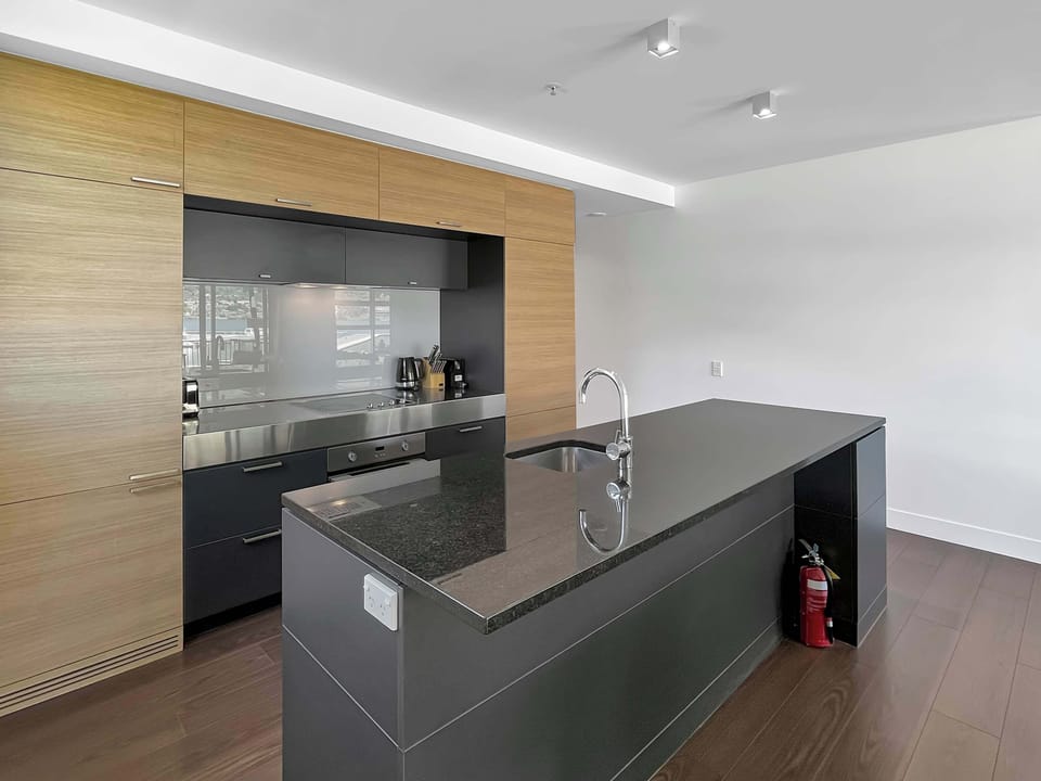 Modern kitchen with quality appliances and plenty of bench space.