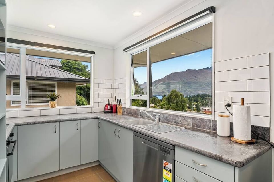Enjoy a fully equipped kitchen with all the appliances you'd expect...

dishwasher, oven, stove, microwave, fridge, kettle, toaster, rice cooker, pots and pans, etc.

Best of all... the views from the kitchen are to die for!
