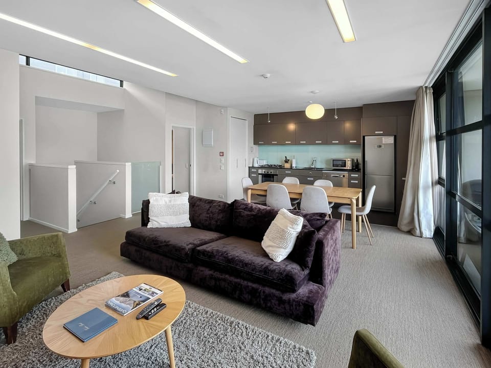 Spacious open-plan living, dining, and kitchen