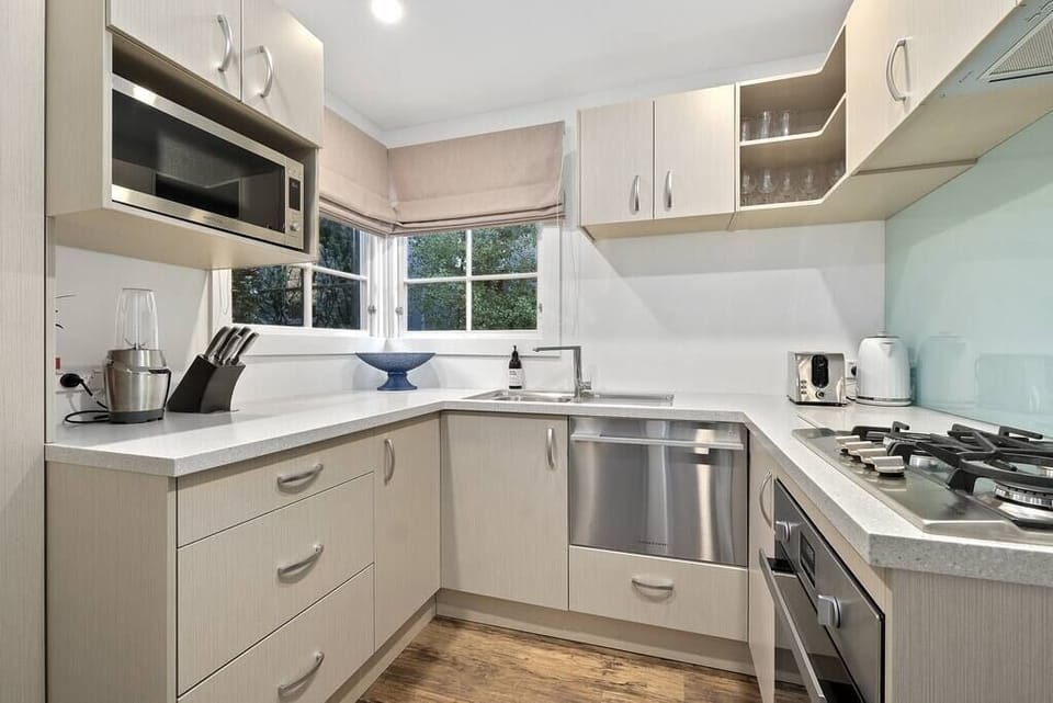 Enjoy the gourmet kitchen, with all the modern appliances and equipment you would expect.