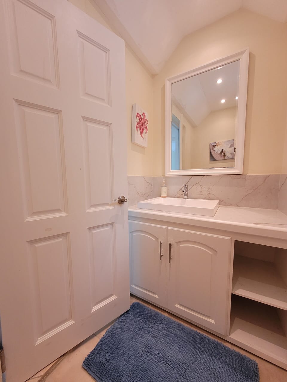 Powder room in hallway